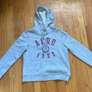 gray Aeropostale hoodie with pink wording